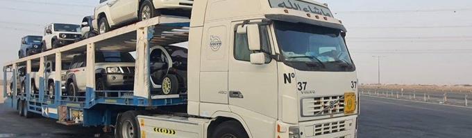 إعلان عن شحن ونقل جميع انواع السيارات من الكويت الى الامارات و عنان و بالعكس
