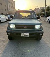 إعلان عن ميتسوبيشي باجيرو io موديل ٢٠٠٠