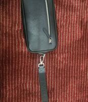 إعلان عن حقيبه يد رجاليه ارماني استعمال خفيف، أصليه من بوتيك الكويت