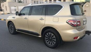 إعلان عن جيب نيسان باترول بلاتنيوم مديل  2014  لون ذهبي