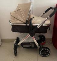 إعلان عن للبيع عربانه و كرسي سيارة للاطفال من براند mothercareحالتها كالجديدة