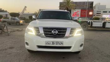 إعلان عن الروضة للبيع نيسان باترول 2015 بلاتينيوم قمة بنظافه داخل تان ممتازه
