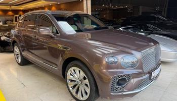 إعلان عن الري بجانب النصر الرياضي توب جير للسيارات