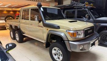 إعلان عن الري بجانب النصر الرياضي توب جير للسيارات