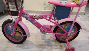 إعلان عن Golden Kids Pink Bicycle with Training Wheels