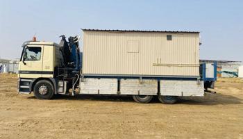 إعلان عن لوري كرين لتأجير ونقل جميع مواد البناء وغرف الكيربي