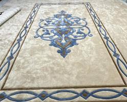 إعلان عن سجاد نقشات حفر يدوي